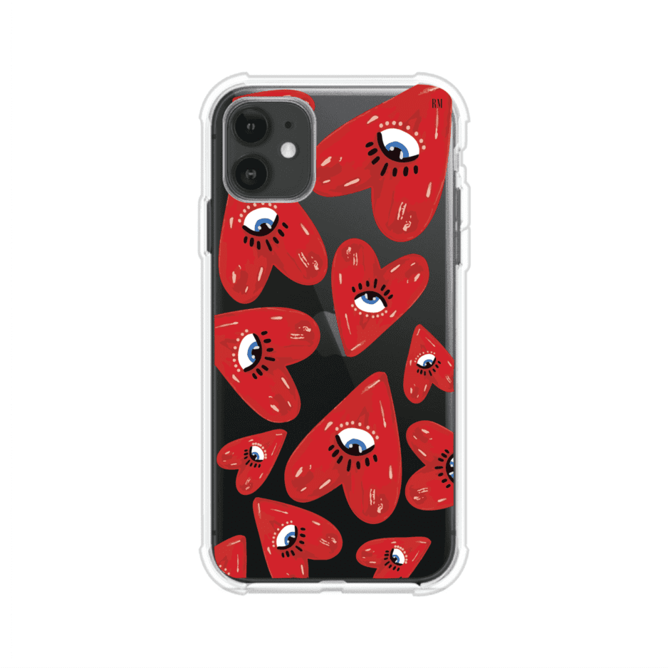 Funda para iPhone con diseño de corazones rojos ilustrados con ojos al centro. Estilo artístico, llamativo y original. Ideal para quienes buscan un accesorio único. Diseño de Remark MX