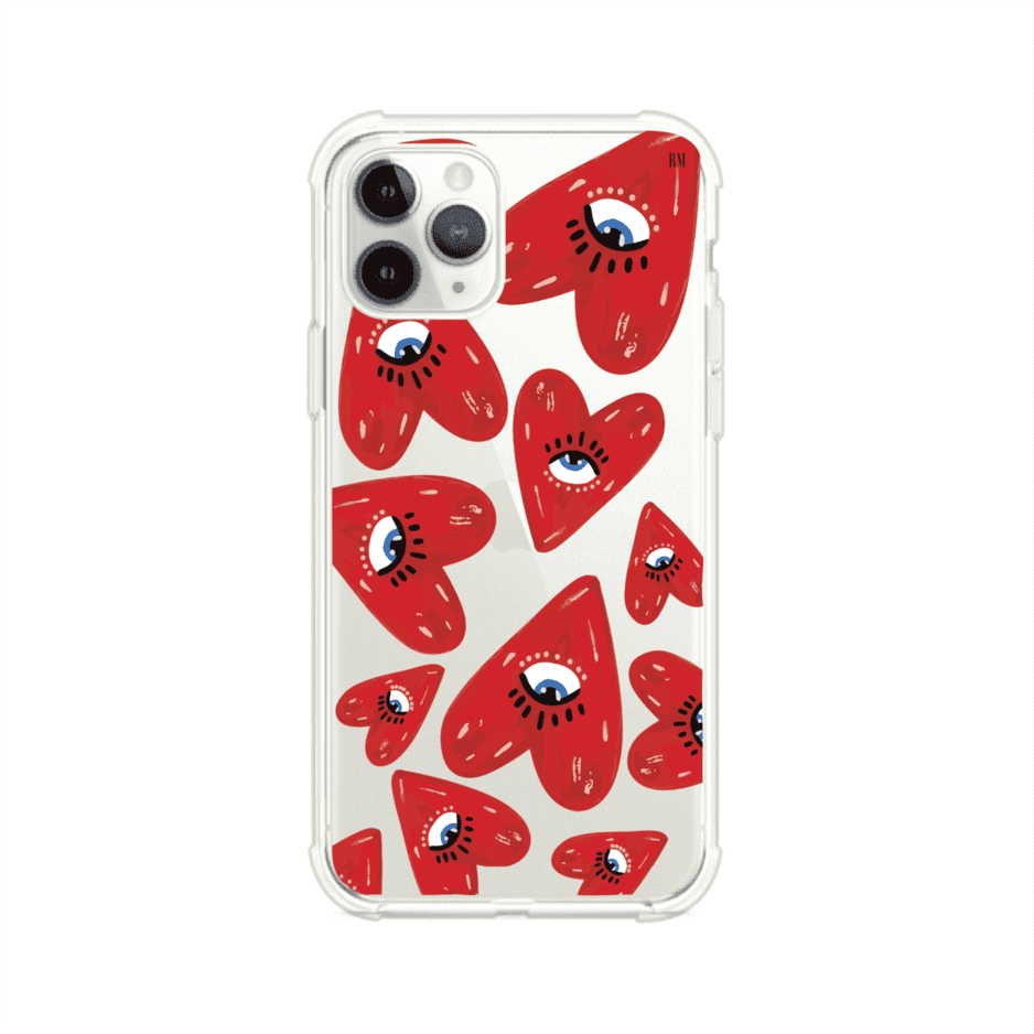 Funda para iPhone con diseño de corazones rojos ilustrados con ojos al centro. Estilo artístico, llamativo y original. Ideal para quienes buscan un accesorio único. Diseño de Remark MX