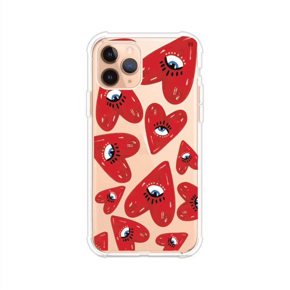 Funda para iPhone con diseño de corazones rojos ilustrados con ojos al centro. Estilo artístico, llamativo y original. Ideal para quienes buscan un accesorio único. Diseño de Remark MX