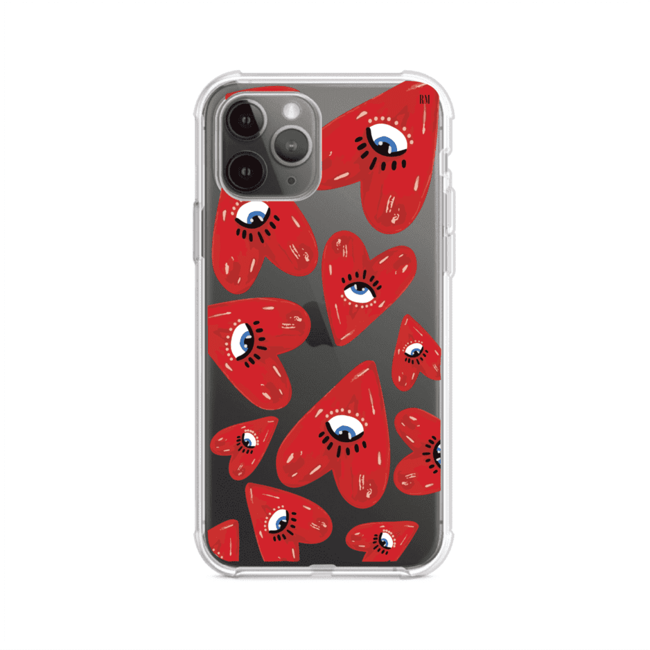 Funda para iPhone con diseño de corazones rojos ilustrados con ojos al centro. Estilo artístico, llamativo y original. Ideal para quienes buscan un accesorio único. Diseño de Remark MX