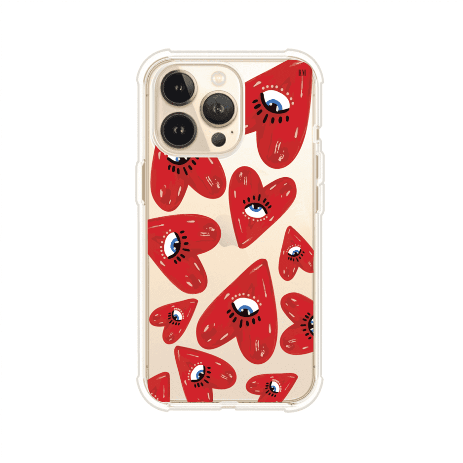 Funda para iPhone con diseño de corazones rojos ilustrados con ojos al centro. Estilo artístico, llamativo y original. Ideal para quienes buscan un accesorio único. Diseño de Remark MX
