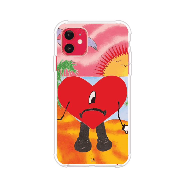 Funda para iPhone inspirada en el álbum "Un Verano Sin Ti" de Bad Bunny. Diseño con fondo de playa, palmeras, atardecer, delfines y el icónico corazón triste con piernas. Estilo colorido, urbano y veraniego. Producto de Remark Mx