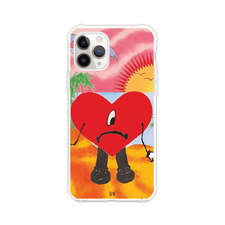 Funda para iPhone inspirada en el álbum "Un Verano Sin Ti" de Bad Bunny. Diseño con fondo de playa, palmeras, atardecer, delfines y el icónico corazón triste con piernas. Estilo colorido, urbano y veraniego. Producto de Remark Mx