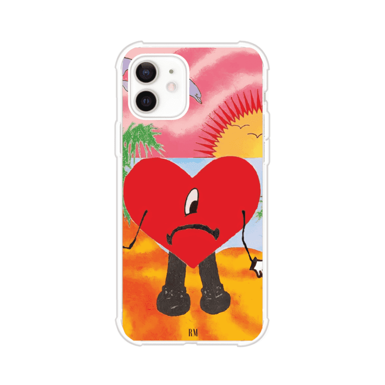 Funda para iPhone inspirada en el álbum "Un Verano Sin Ti" de Bad Bunny. Diseño con fondo de playa, palmeras, atardecer, delfines y el icónico corazón triste con piernas. Estilo colorido, urbano y veraniego. Producto de Remark Mx