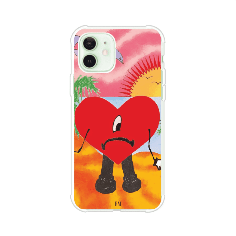 Funda para iPhone inspirada en el álbum "Un Verano Sin Ti" de Bad Bunny. Diseño con fondo de playa, palmeras, atardecer, delfines y el icónico corazón triste con piernas. Estilo colorido, urbano y veraniego. Producto de Remark Mx