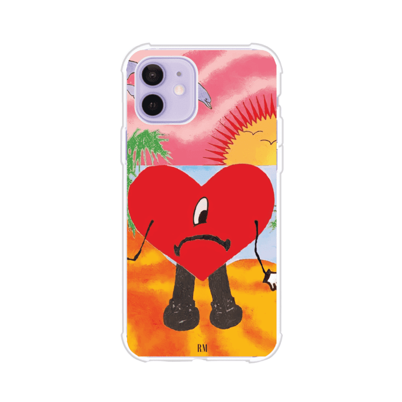 Funda para iPhone inspirada en el álbum "Un Verano Sin Ti" de Bad Bunny. Diseño con fondo de playa, palmeras, atardecer, delfines y el icónico corazón triste con piernas. Estilo colorido, urbano y veraniego. Producto de Remark Mx