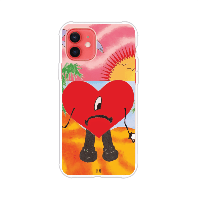 Funda para iPhone inspirada en el álbum "Un Verano Sin Ti" de Bad Bunny. Diseño con fondo de playa, palmeras, atardecer, delfines y el icónico corazón triste con piernas. Estilo colorido, urbano y veraniego. Producto de Remark Mx
