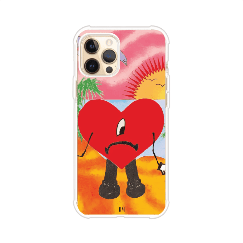 Funda para iPhone inspirada en el álbum "Un Verano Sin Ti" de Bad Bunny. Diseño con fondo de playa, palmeras, atardecer, delfines y el icónico corazón triste con piernas. Estilo colorido, urbano y veraniego. Producto de Remark Mx