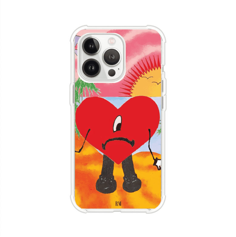 Funda para iPhone inspirada en el álbum "Un Verano Sin Ti" de Bad Bunny. Diseño con fondo de playa, palmeras, atardecer, delfines y el icónico corazón triste con piernas. Estilo colorido, urbano y veraniego. Producto de Remark Mx