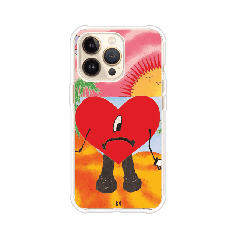 Funda para iPhone inspirada en el álbum "Un Verano Sin Ti" de Bad Bunny. Diseño con fondo de playa, palmeras, atardecer, delfines y el icónico corazón triste con piernas. Estilo colorido, urbano y veraniego. Producto de Remark Mx