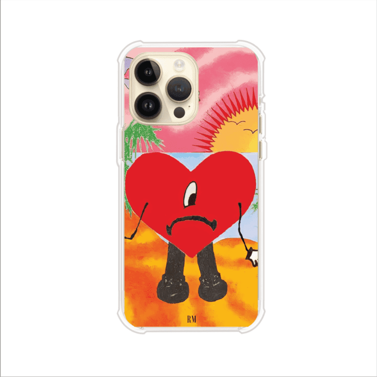 Funda para iPhone inspirada en el álbum "Un Verano Sin Ti" de Bad Bunny. Diseño con fondo de playa, palmeras, atardecer, delfines y el icónico corazón triste con piernas. Estilo colorido, urbano y veraniego. Producto de Remark Mx