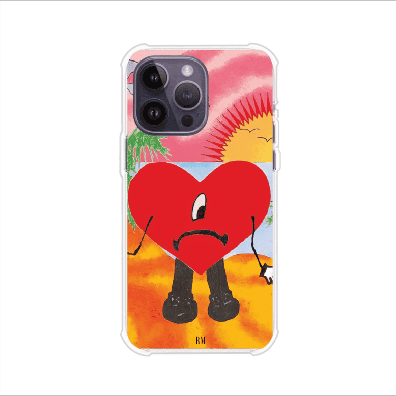 Funda para iPhone inspirada en el álbum "Un Verano Sin Ti" de Bad Bunny. Diseño con fondo de playa, palmeras, atardecer, delfines y el icónico corazón triste con piernas. Estilo colorido, urbano y veraniego. Producto de Remark Mx
