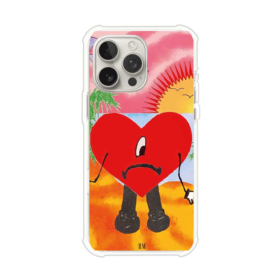 Funda para iPhone inspirada en el álbum "Un Verano Sin Ti" de Bad Bunny. Diseño con fondo de playa, palmeras, atardecer, delfines y el icónico corazón triste con piernas. Estilo colorido, urbano y veraniego. Producto de Remark Mx