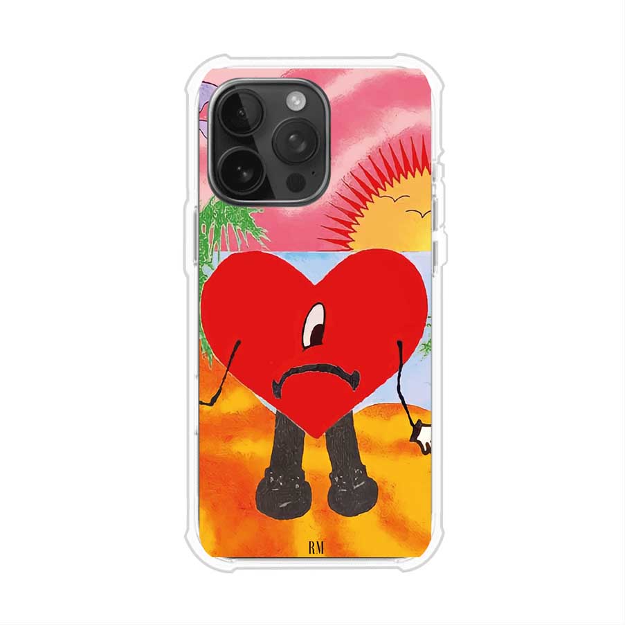 Funda para iPhone inspirada en el álbum "Un Verano Sin Ti" de Bad Bunny. Diseño con fondo de playa, palmeras, atardecer, delfines y el icónico corazón triste con piernas. Estilo colorido, urbano y veraniego. Producto de Remark Mx