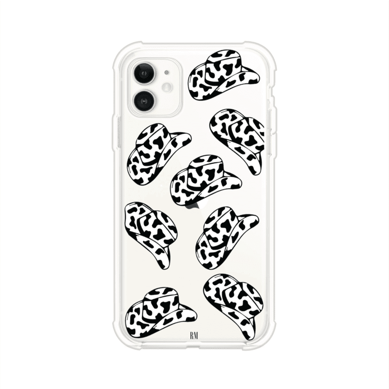 Funda para iPhone con diseño de múltiples sombreros vaqueros en estampado blanco y negro tipo vaca. Estilo western minimalista con vibe country. Producto de Remark Mx.
