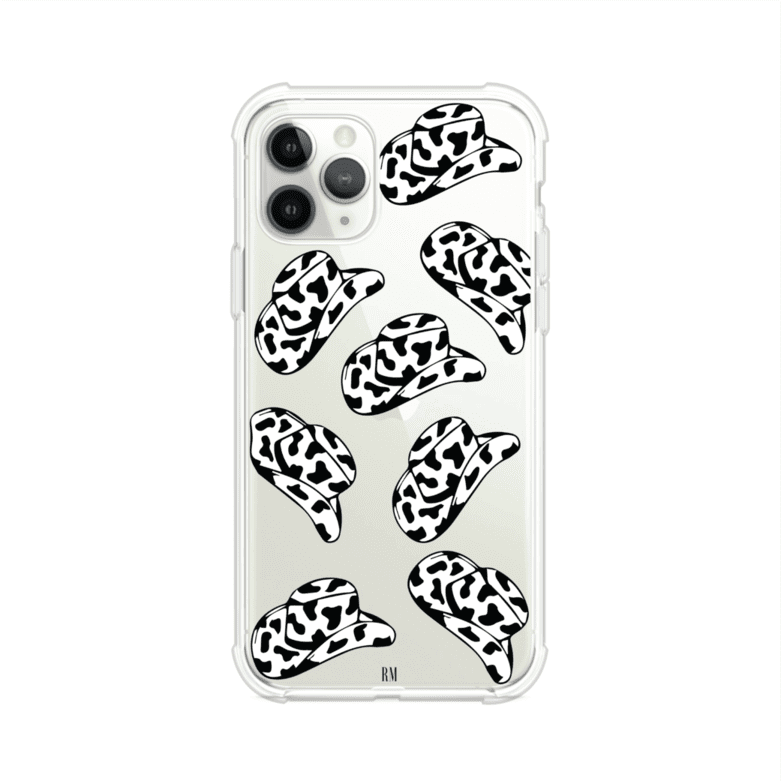 Funda para iPhone con diseño de múltiples sombreros vaqueros en estampado blanco y negro tipo vaca. Estilo western minimalista con vibe country. Producto de Remark Mx.