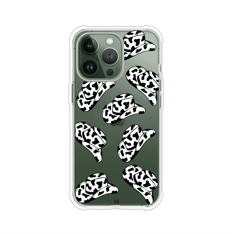 Funda para iPhone con diseño de múltiples sombreros vaqueros en estampado blanco y negro tipo vaca. Estilo western minimalista con vibe country. Producto de Remark Mx.