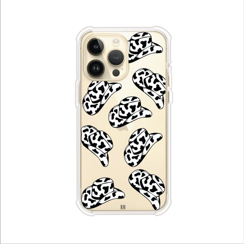 Funda para iPhone con diseño de múltiples sombreros vaqueros en estampado blanco y negro tipo vaca. Estilo western minimalista con vibe country. Producto de Remark Mx.