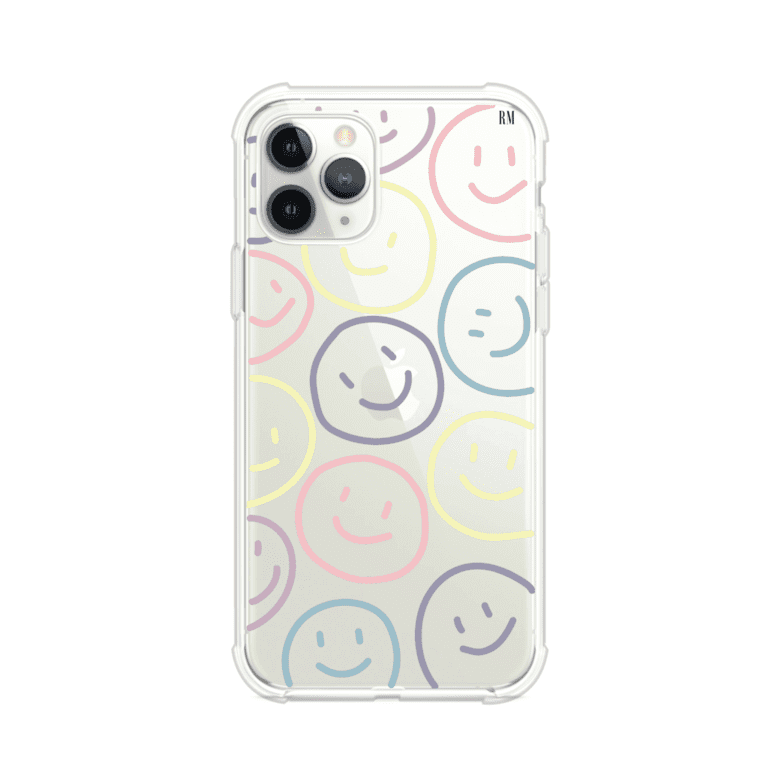 Funda personalizada para iPhone con diseño de caritas felices o happy faces en colores pastel, ideal para un estilo divertido y colorido; producto de Remark MX
