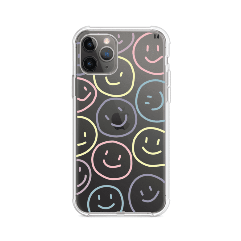 Funda personalizada para iPhone con diseño de caritas felices o happy faces en colores pastel, ideal para un estilo divertido y colorido; producto de Remark MX