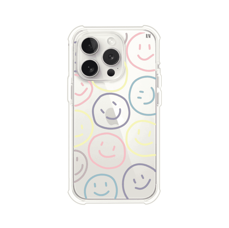 Funda personalizada para iPhone con diseño de caritas felices o happy faces en colores pastel, ideal para un estilo divertido y colorido; producto de Remark MX