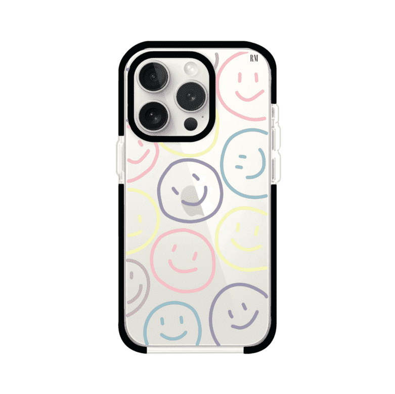 Funda personalizada para iPhone con diseño de caritas felices o happy faces en colores pastel, ideal para un estilo divertido y colorido; producto de Remark MX