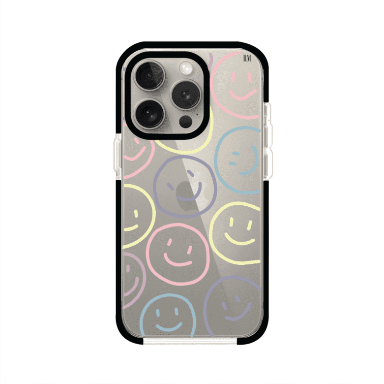 Funda personalizada para iPhone con diseño de caritas felices o happy faces en colores pastel, ideal para un estilo divertido y colorido; producto de Remark MX