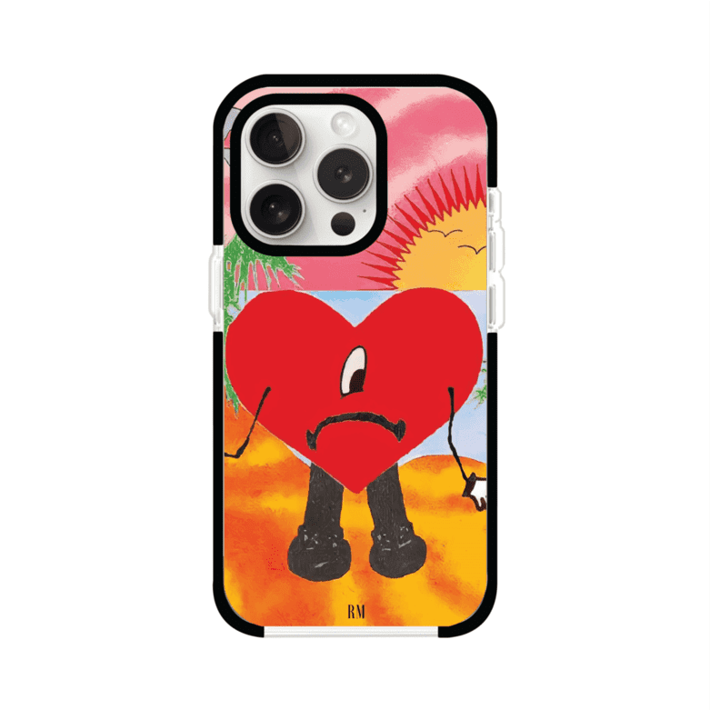 Funda para iPhone inspirada en el álbum "Un Verano Sin Ti" de Bad Bunny. Diseño con fondo de playa, palmeras, atardecer, delfines y el icónico corazón triste con piernas. Estilo colorido, urbano y veraniego. Producto de Remark Mx