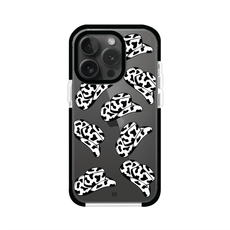 Funda para iPhone con diseño de múltiples sombreros vaqueros en estampado blanco y negro tipo vaca. Estilo western minimalista con vibe country. Producto de Remark Mx.