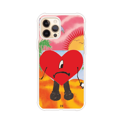 Funda para iPhone inspirada en el álbum "Un Verano Sin Ti" de Bad Bunny. Diseño con fondo de playa, palmeras, atardecer, delfines y el icónico corazón triste con piernas. Estilo colorido, urbano y veraniego. Producto de Remark Mx