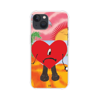 Funda para iPhone inspirada en el álbum "Un Verano Sin Ti" de Bad Bunny. Diseño con fondo de playa, palmeras, atardecer, delfines y el icónico corazón triste con piernas. Estilo colorido, urbano y veraniego. Producto de Remark Mx