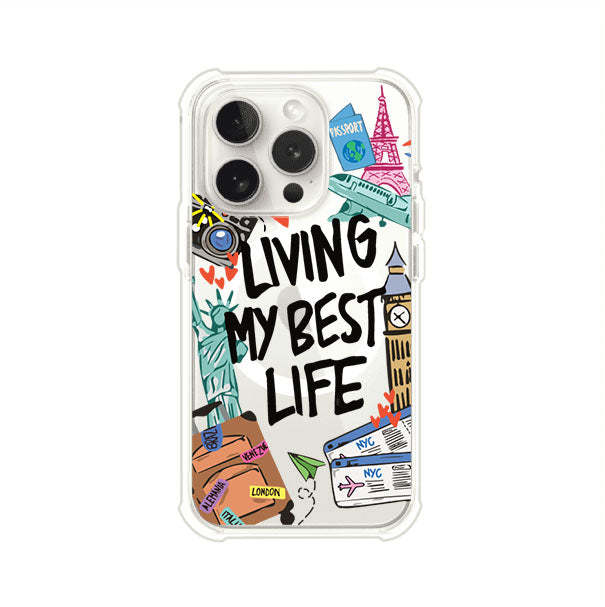 Funda personalizada para iPhone con frase 'Living My Best Life' y diseño de elementos viajeros como maletas, torre Eiffel, Big Ben y boletos de avión; producto de Remark MX
