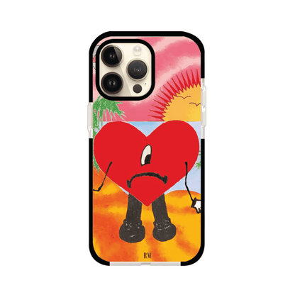 Funda para iPhone inspirada en el álbum "Un Verano Sin Ti" de Bad Bunny. Diseño con fondo de playa, palmeras, atardecer, delfines y el icónico corazón triste con piernas. Estilo colorido, urbano y veraniego. Producto de Remark Mx